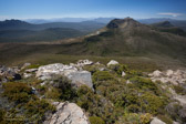 The convoluted cliff lines lead to the dolerite summit. Mt Bisdee can be seen over the right shoulder.