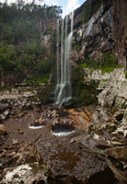 Descent is made around the western escarpment leading to the broken base.